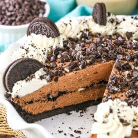 Baileys Chocolate Cream Pie with a slice removed in a white platter