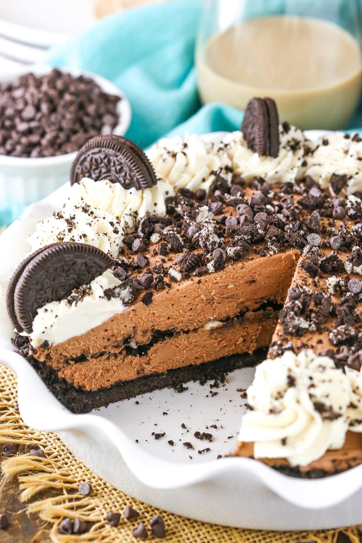 Baileys Chocolate Cream Pie with a slice removed in a white platter