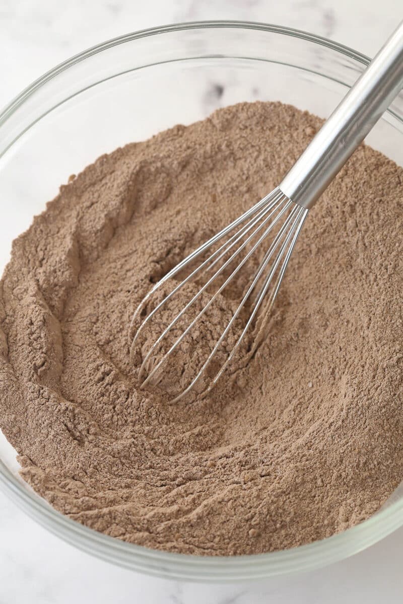 Whisking together the dry ingredients fro chocolate cake.