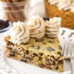 A slice of oatmeal raisin cookie cake on a plate.