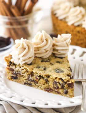 A slice of oatmeal raisin cookie cake on a plate.