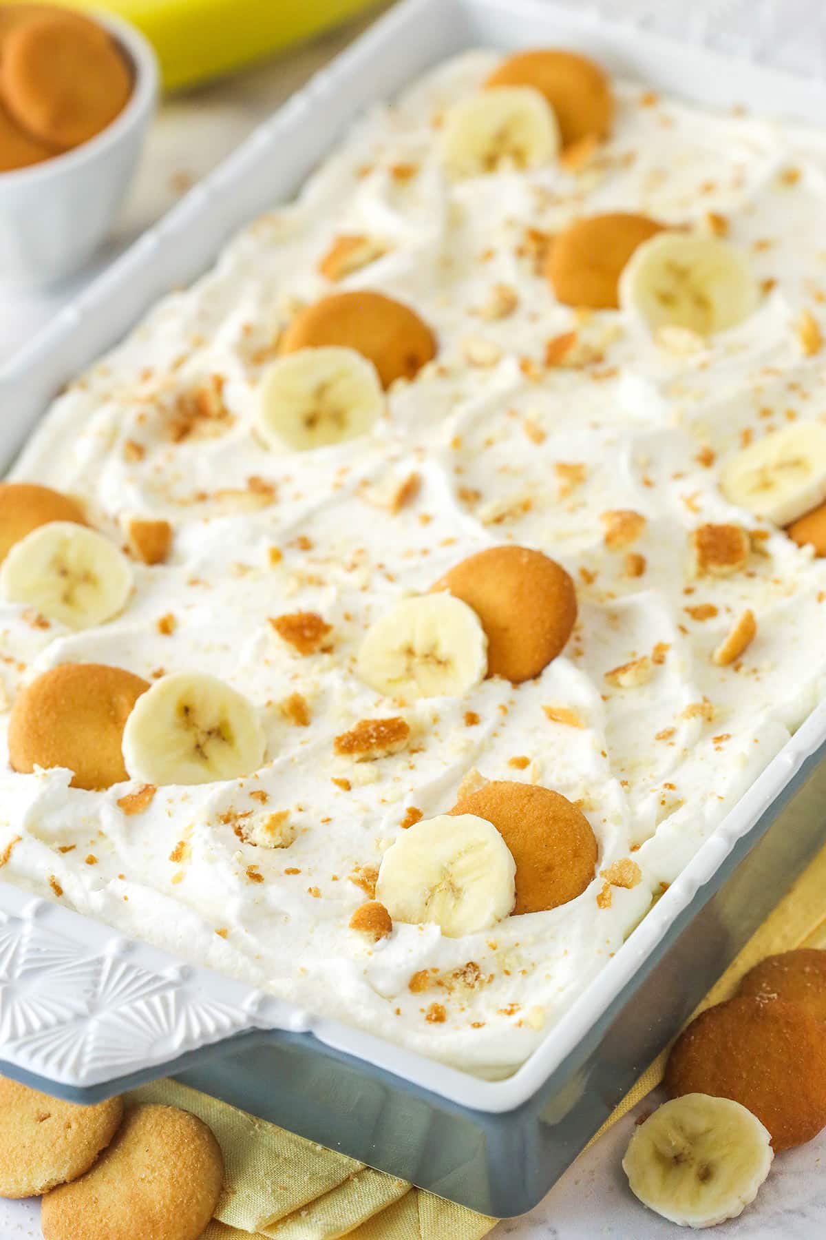 This from-scratch banana pudding is made of layers of vanilla wafers, banana slices, and thick, smooth banana flavor-infused vanilla pudding. Banana pudding in a baking dish.