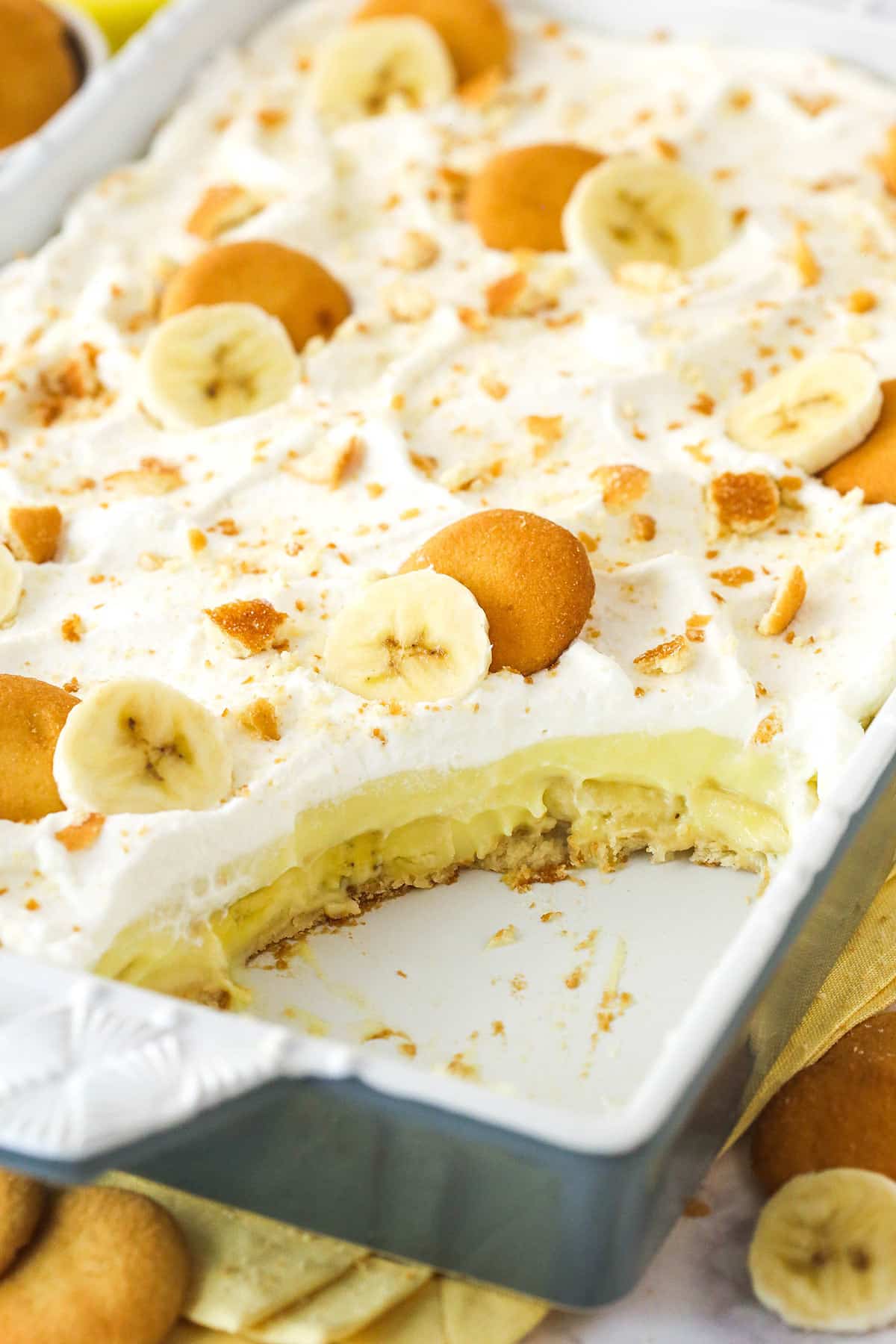 Banana pudding with a slice taken out of it.