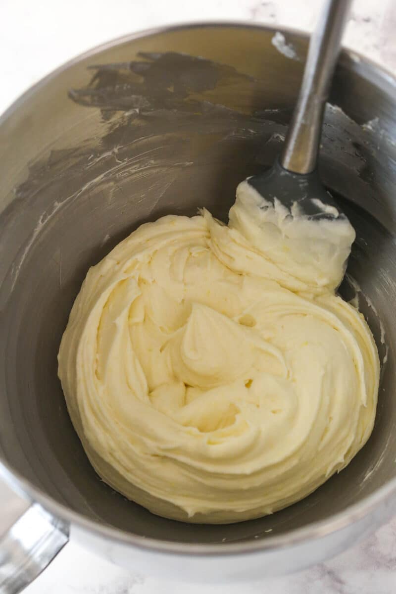 Lemon cream cheese frosting in a mixing bowl.