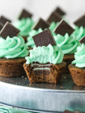 mint chocolate cookie cup with a bite taken out of it so you can see the mint in the middle