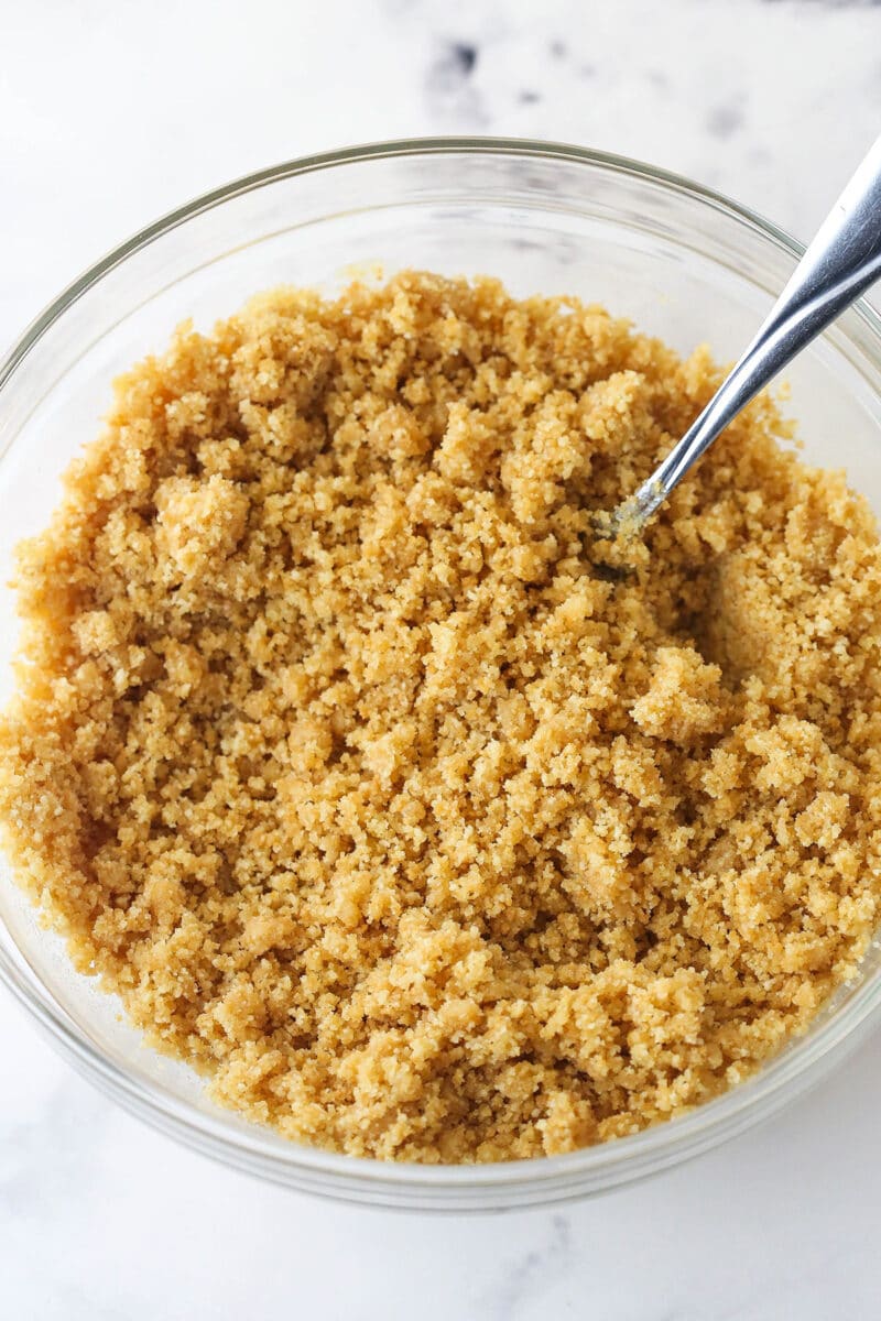 Mixing together the ingredients for a vanilla wafer crust.