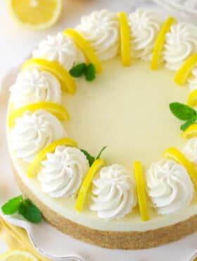 Overhead image of no bake lemon cheesecake on a serving platter.