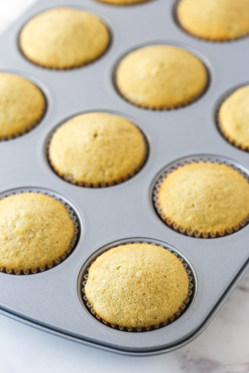 Banana cupcakes in a cupcake tin.