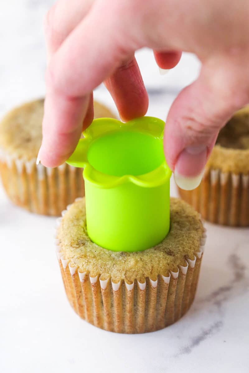 Coring a banana cupcake.