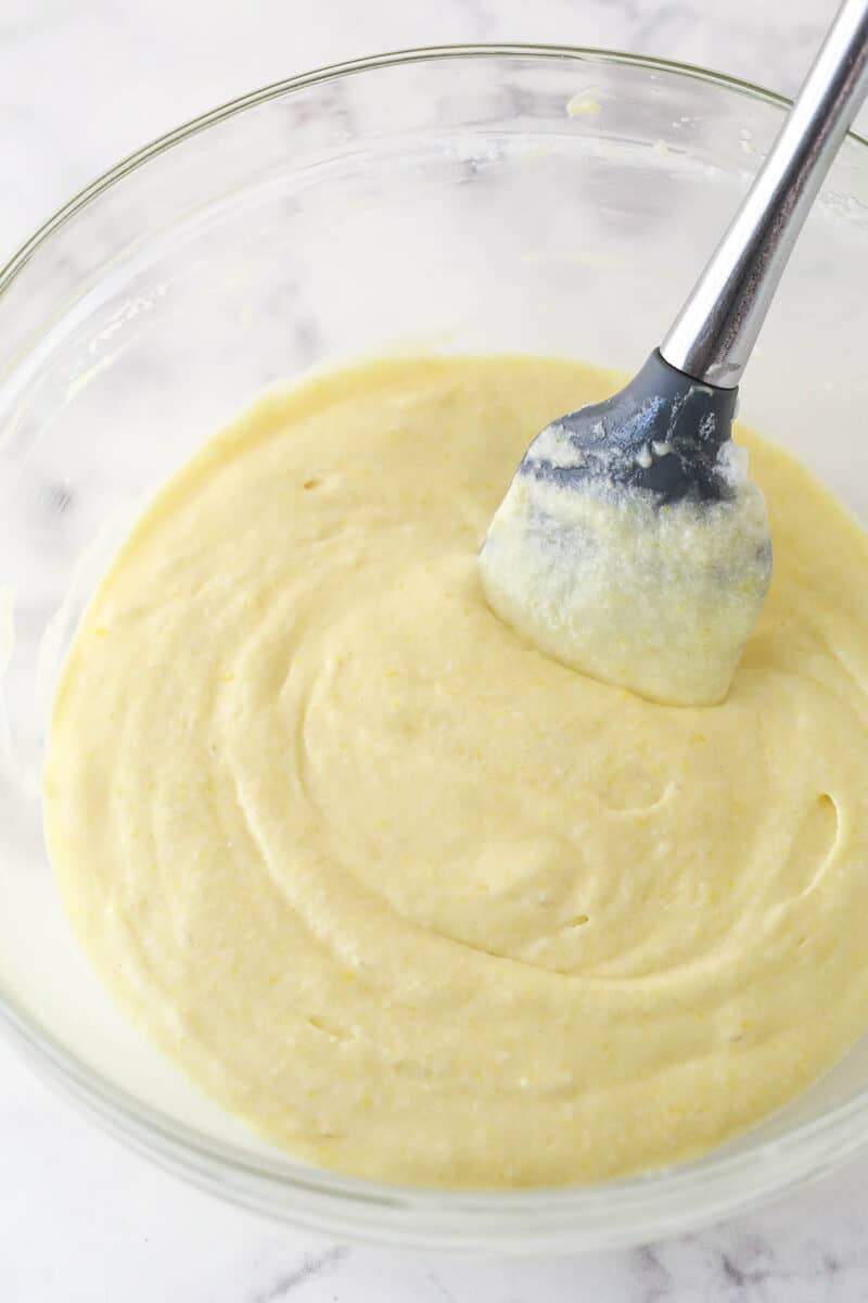 cake batter after folding in the whipped egg whites in glass bowl