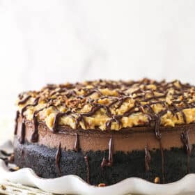 German chocolate cheesecake on a serving platter.