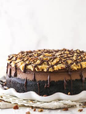 German chocolate cheesecake on a serving platter.