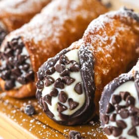 Homemade cannoli on a cutting board