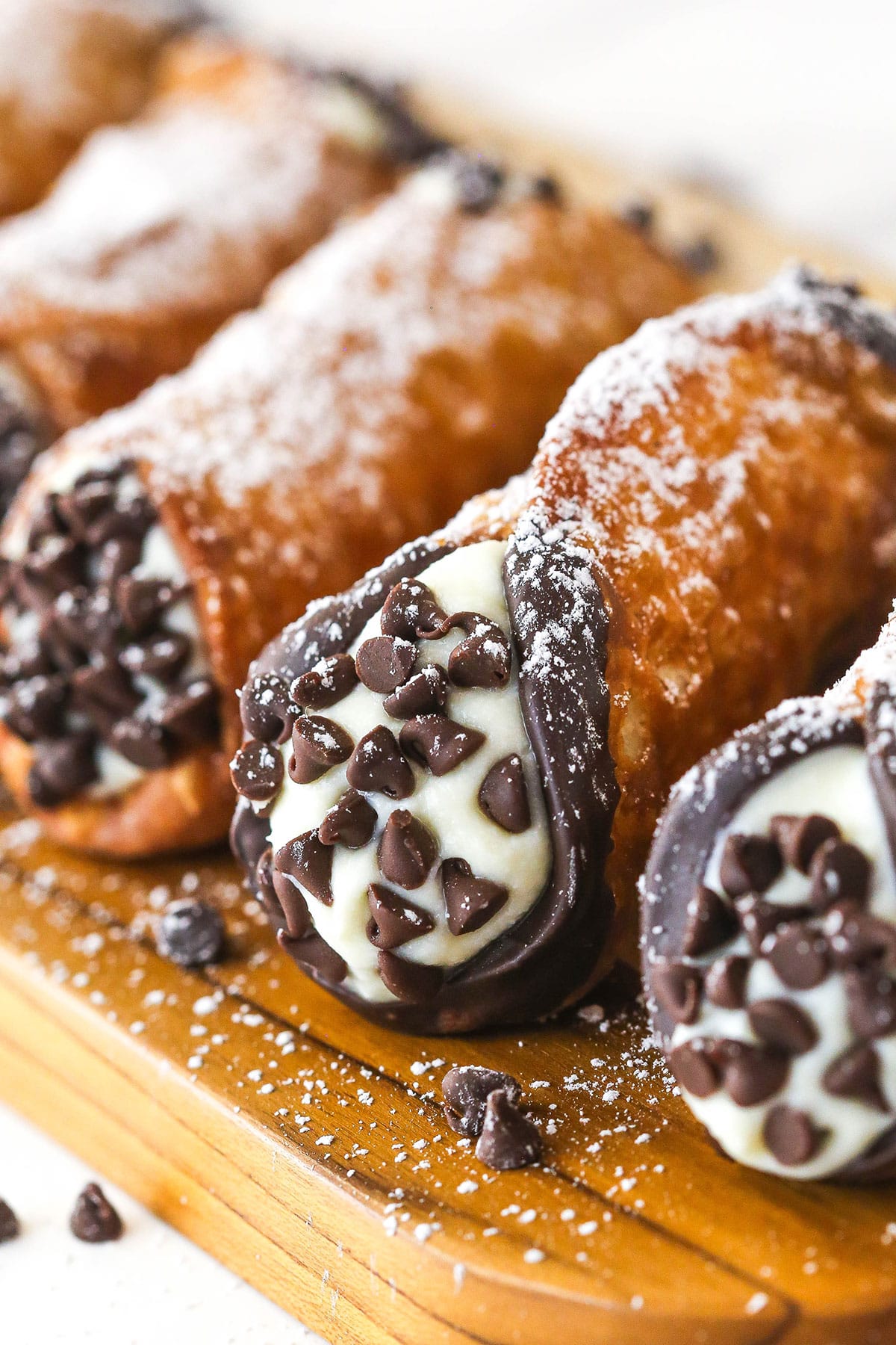 Homemade cannoli on a cutting board