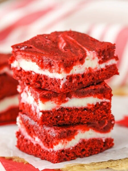 Three Red Velvet Brownies stacked on a white napkin