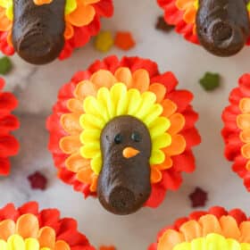 close up of turkey cupcakes on marble countertop
