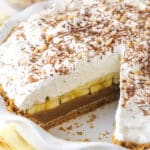 A banoffee pie with a slice missing