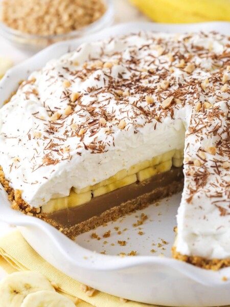 A banoffee pie with a slice missing