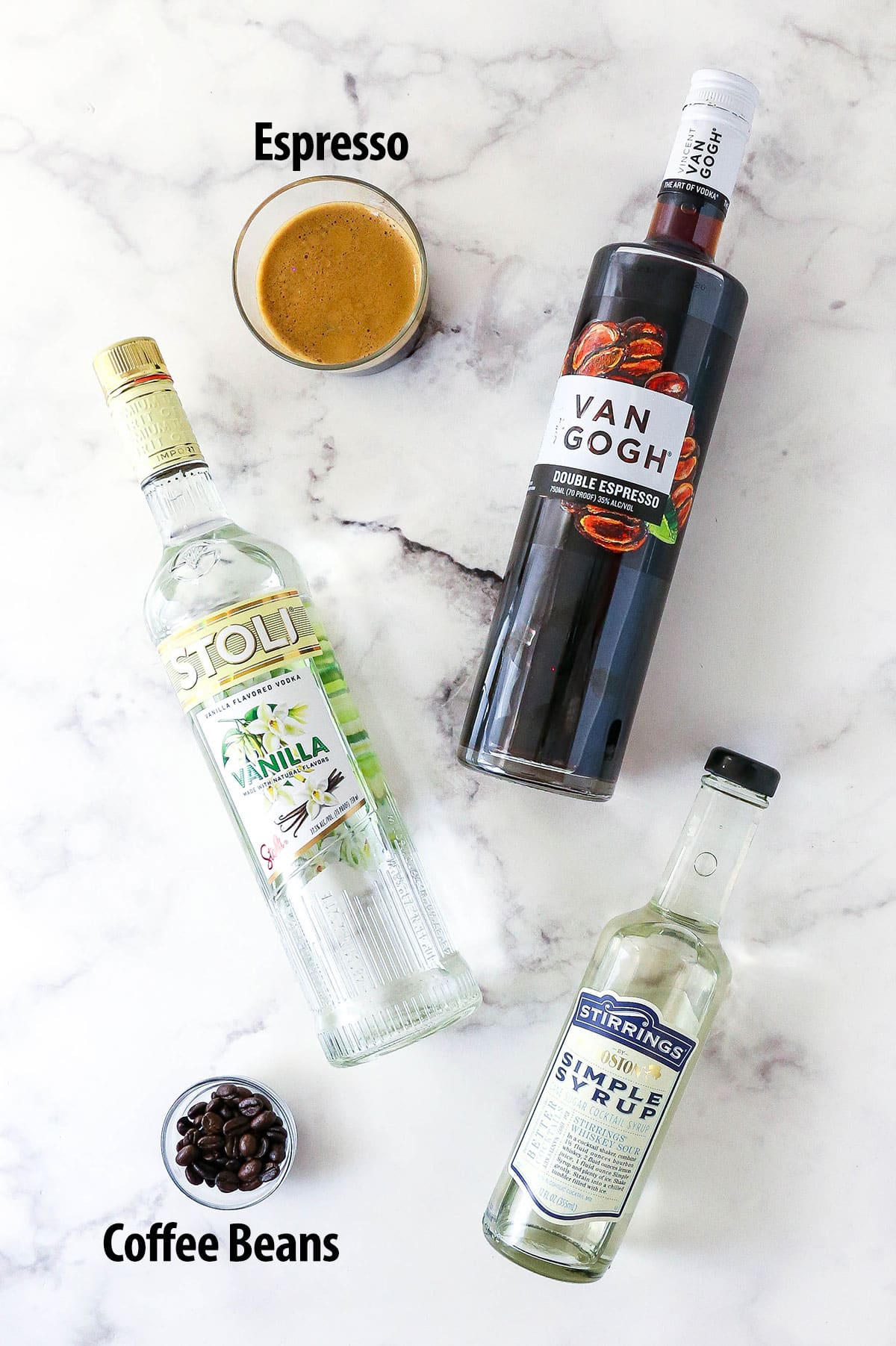 Espresso, vanilla vodka, and espresso vodka combine in this Espresso Martini recipe to make an elegant yet simple cocktail. Overhead view of ingredients needed to make an espresso martini