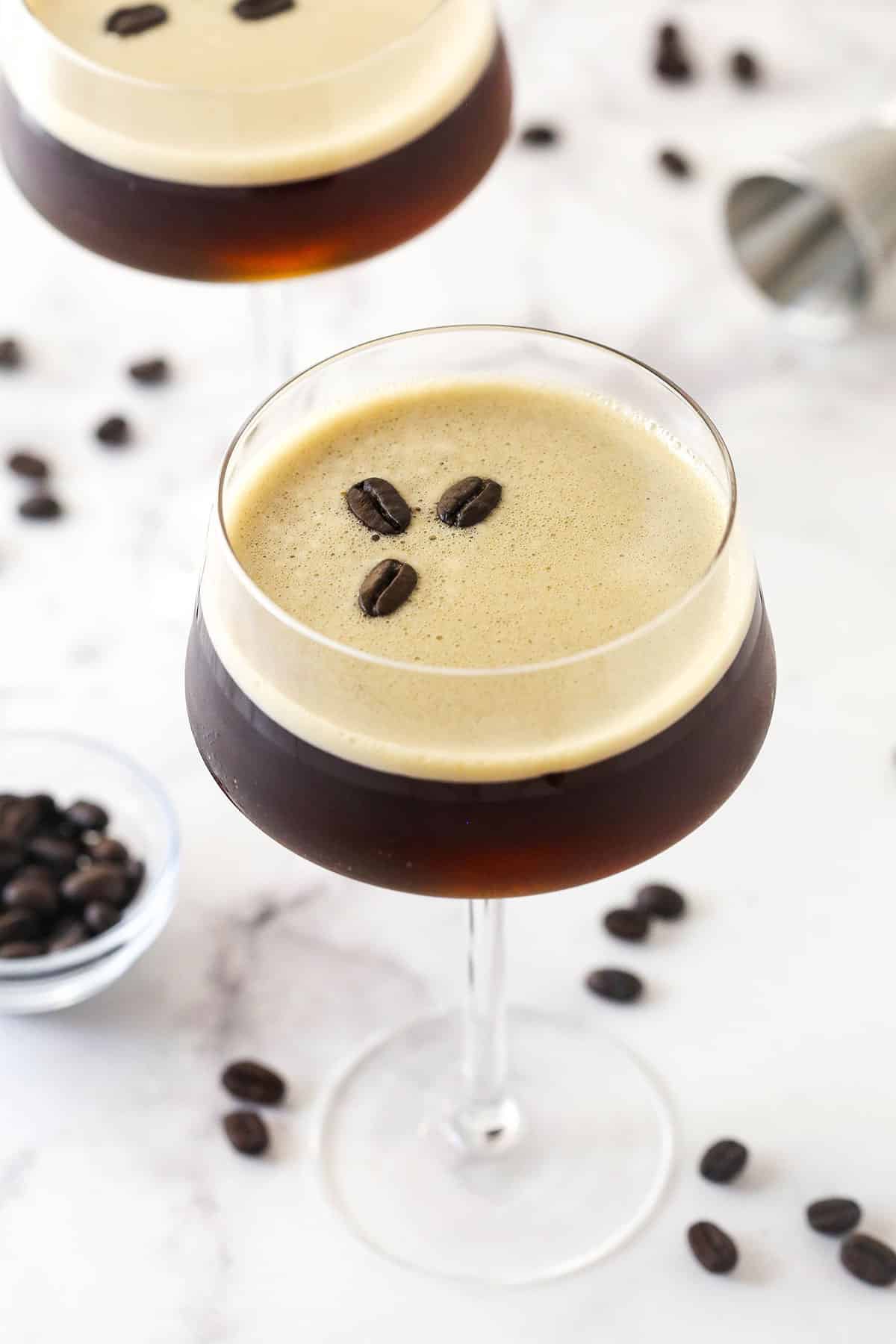 Espresso, vanilla vodka, and espresso vodka combine in this Espresso Martini recipe to make an elegant yet simple cocktail. Overhead view of an espresso martini