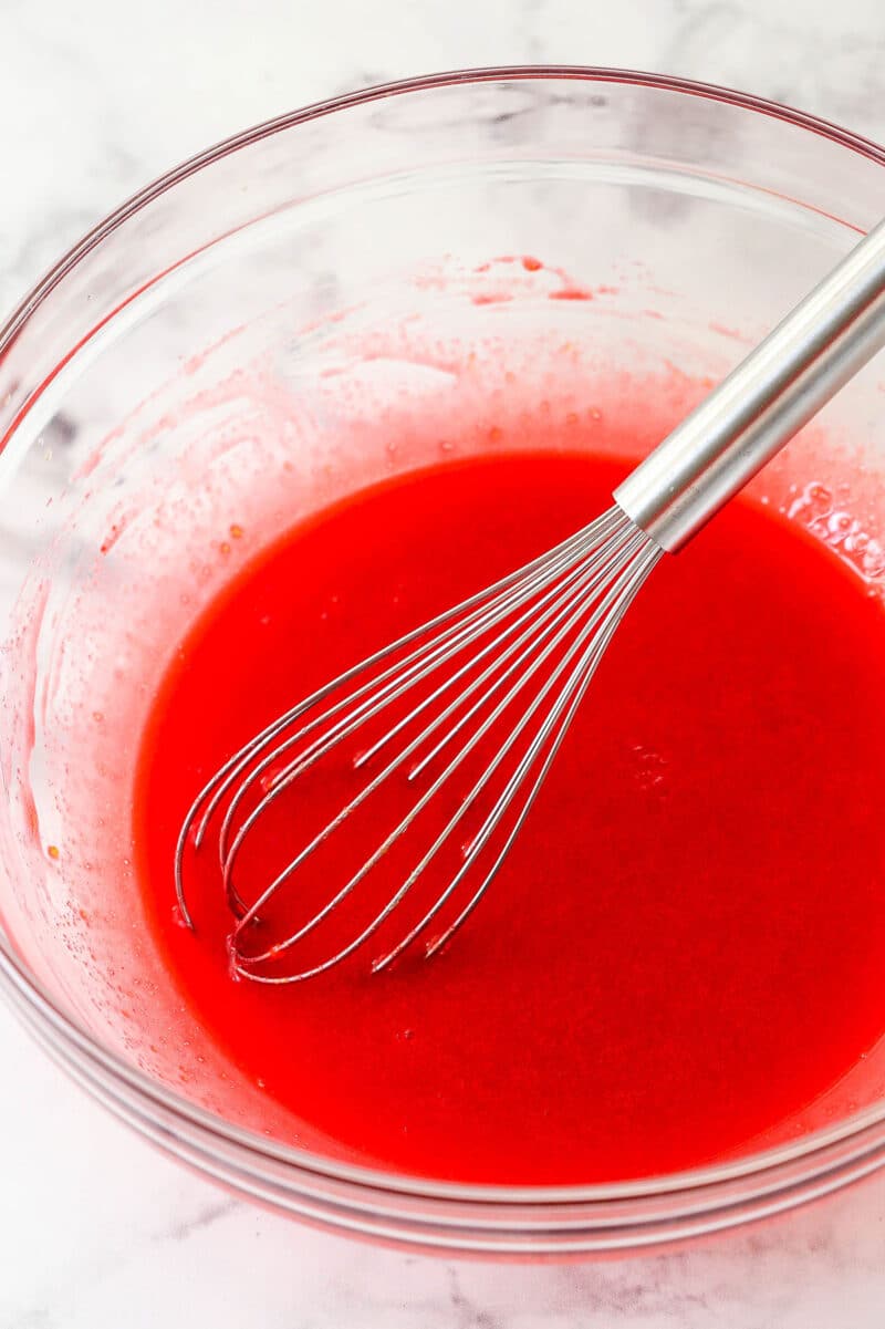 This red velvet cake roll is light and tender with the signature tang and hint of chocolate flavor. Perfect for Christmas & Valentine's Day! Whisking red food coloring into batter