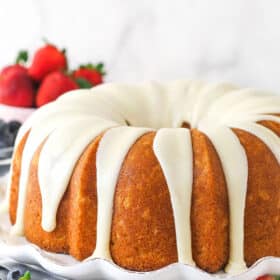 A vanilla bundt cake topped with vanilla icing