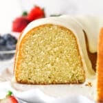 Vanilla bundt cake with a slice removed to show the inside