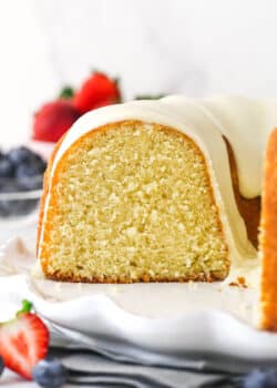 Vanilla bundt cake with a slice removed to show the inside