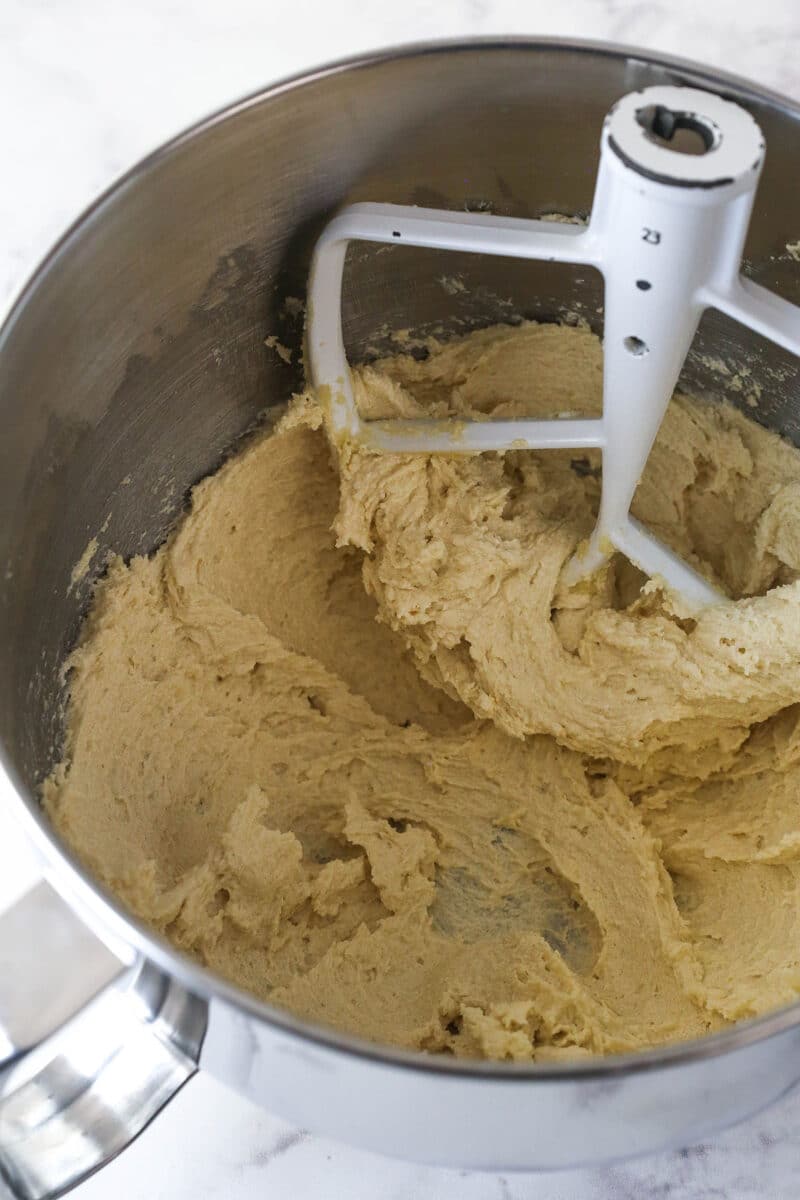 Creaming together the butter and sugars for cookie dough.