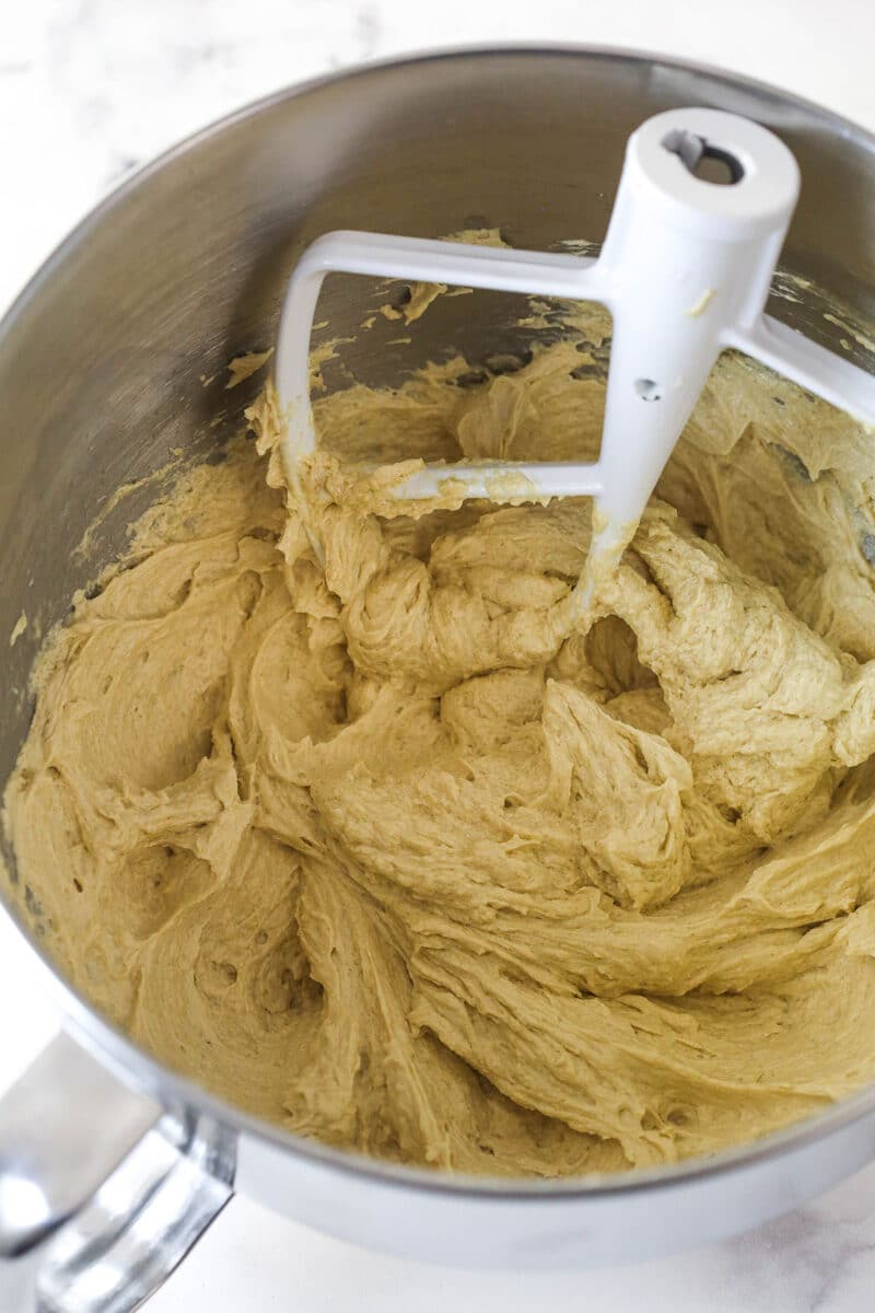 Mixing eggs into cake batter.