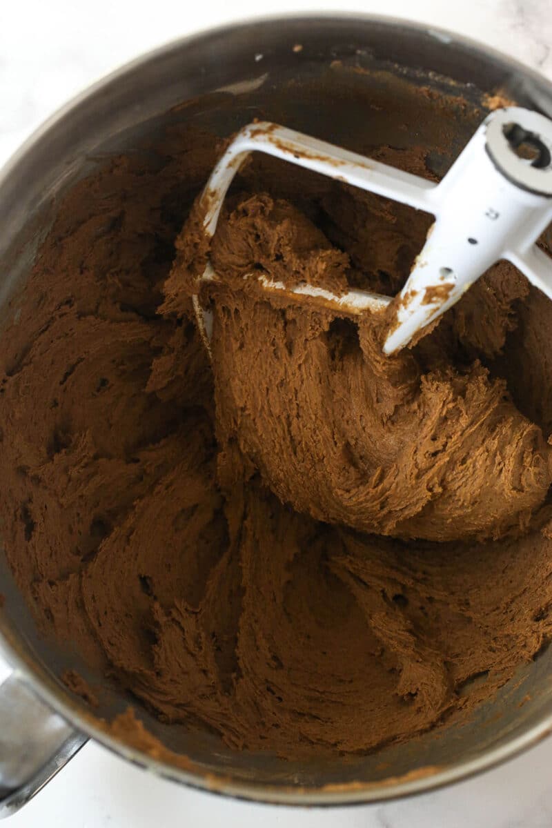 Mixing Irish cream and dry ingredients into cookie dough mixture