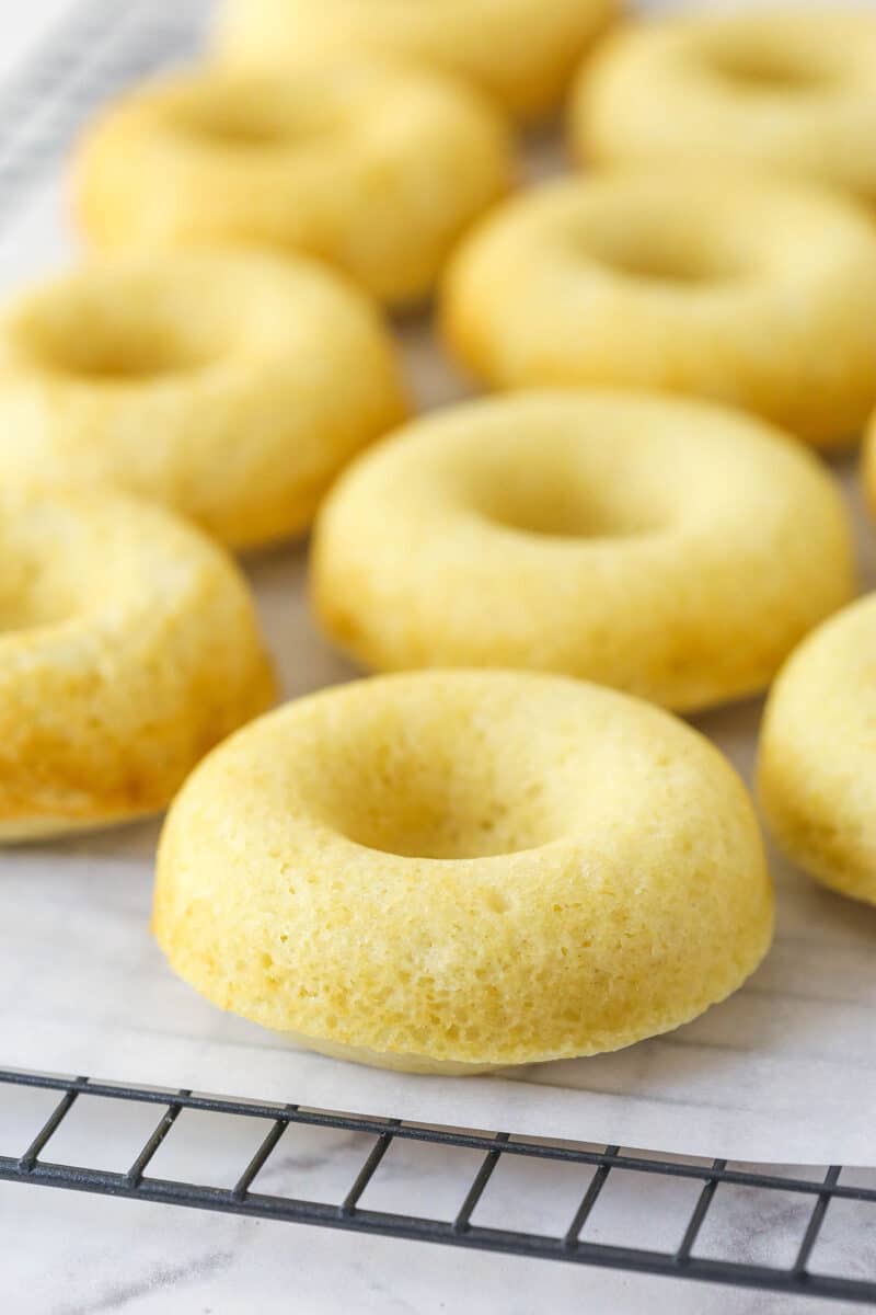 Baked donuts fresh out of the oven before icing.