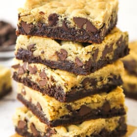 A stack of brookies on a square of parchment.