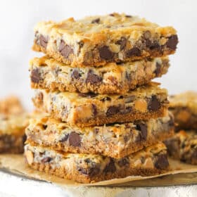 Side view of a stack of magic cookie bars.