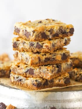 Side view of a stack of magic cookie bars.