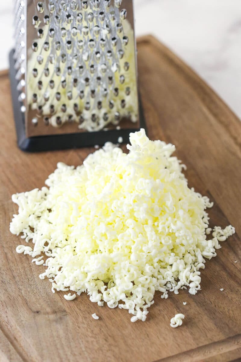 Grated butter on a cutting board.