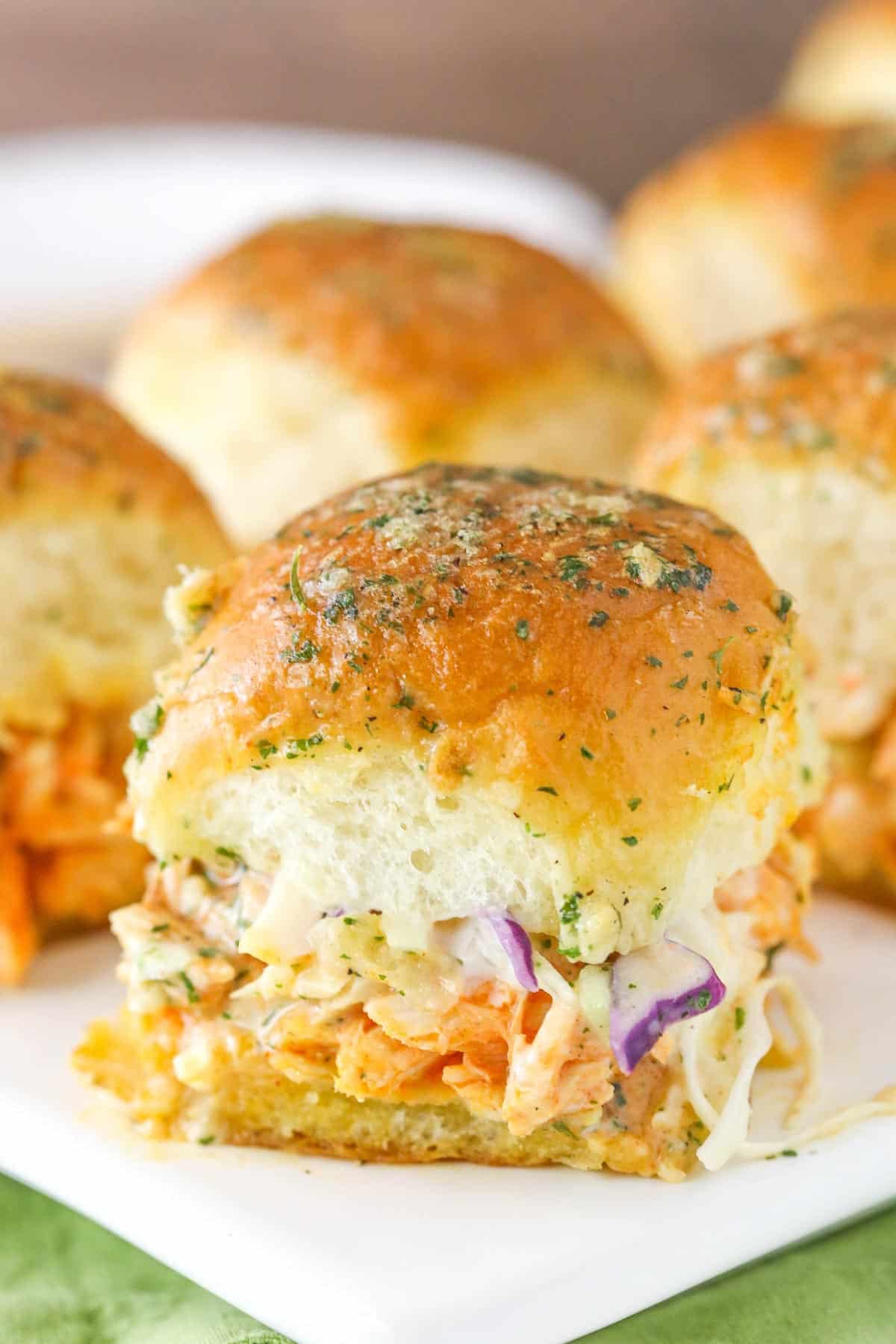 Close up of a buffalo chicken slider.