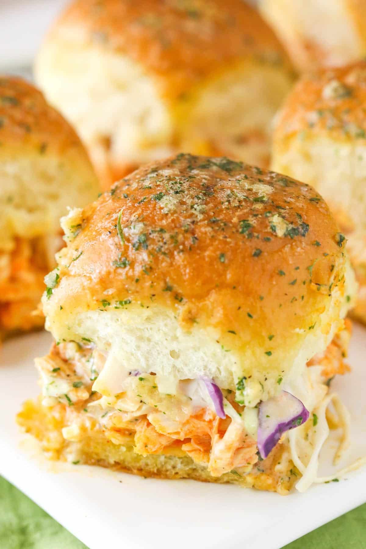 Close up of a buffalo chicken slider.