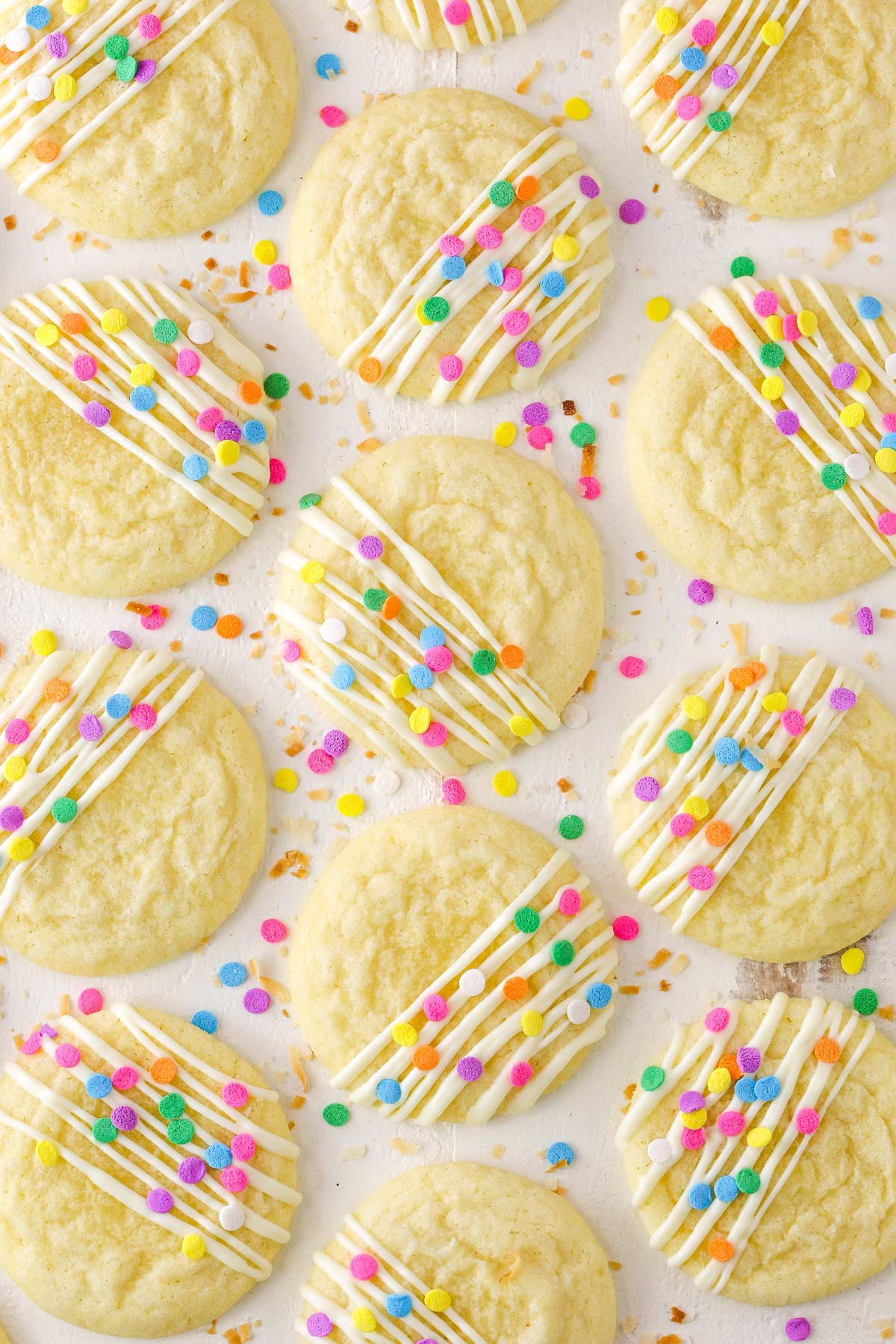 Top view of Coconut Sugar Cookies on a white surface.