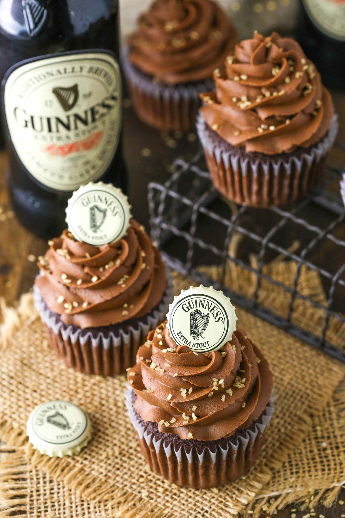 Overhead view of four Guinness chocolate cupcakes.