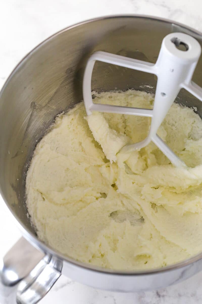 Creaming together butter, oil, and sugar for lemon blueberry bread.