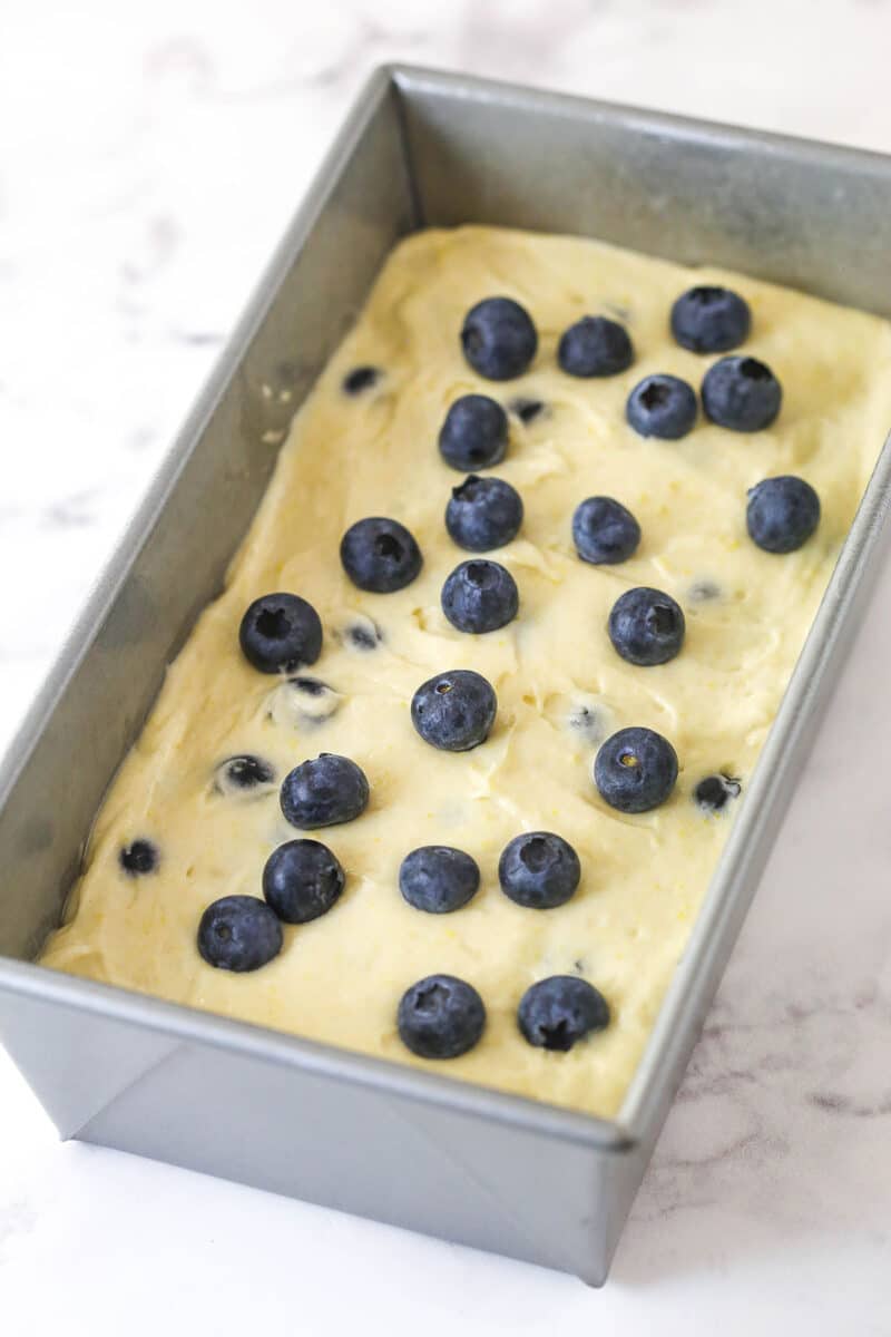 Lemon blueberry batter in a loaf pan.