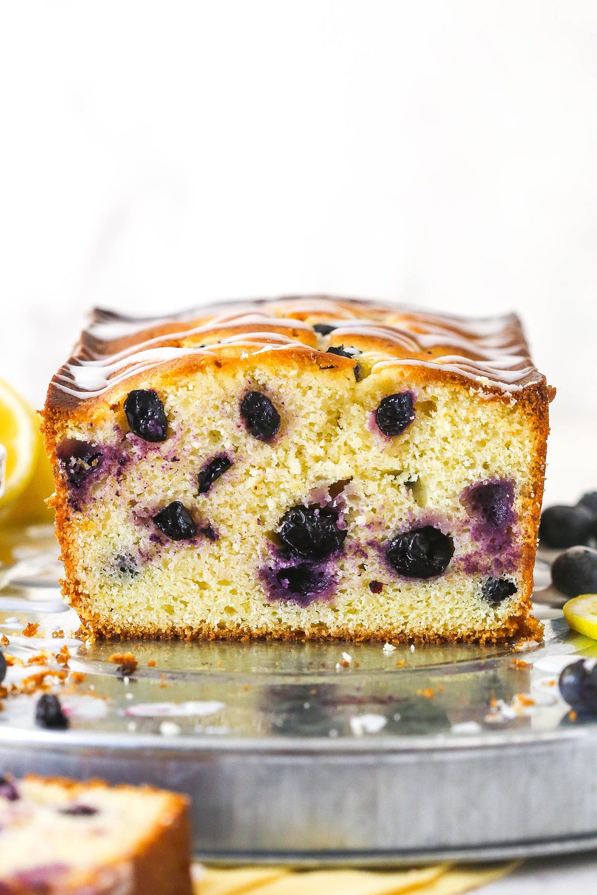 Lemon blueberry bread cut in half.