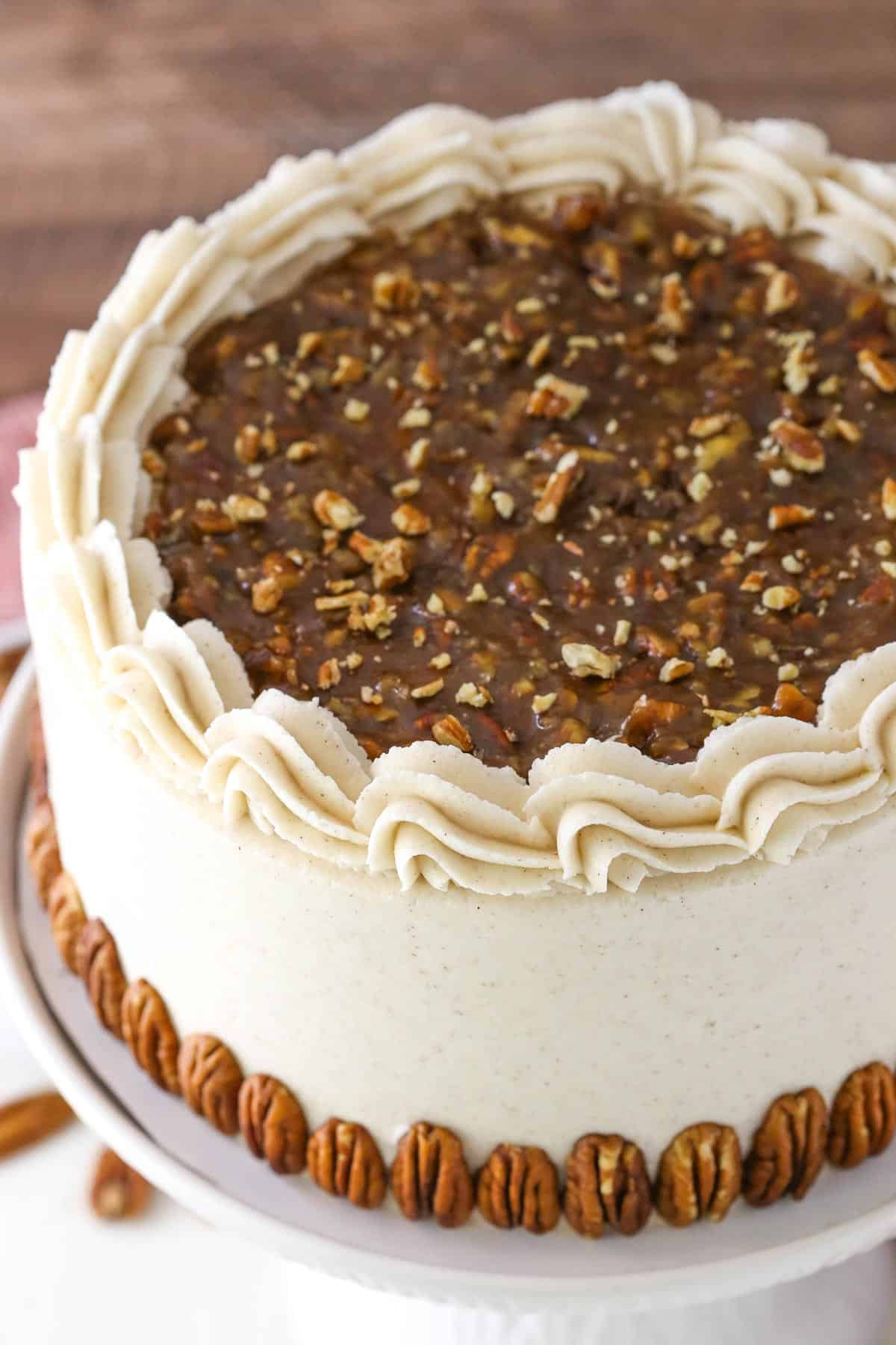 Top view of a decorated pecan pie layer cake.