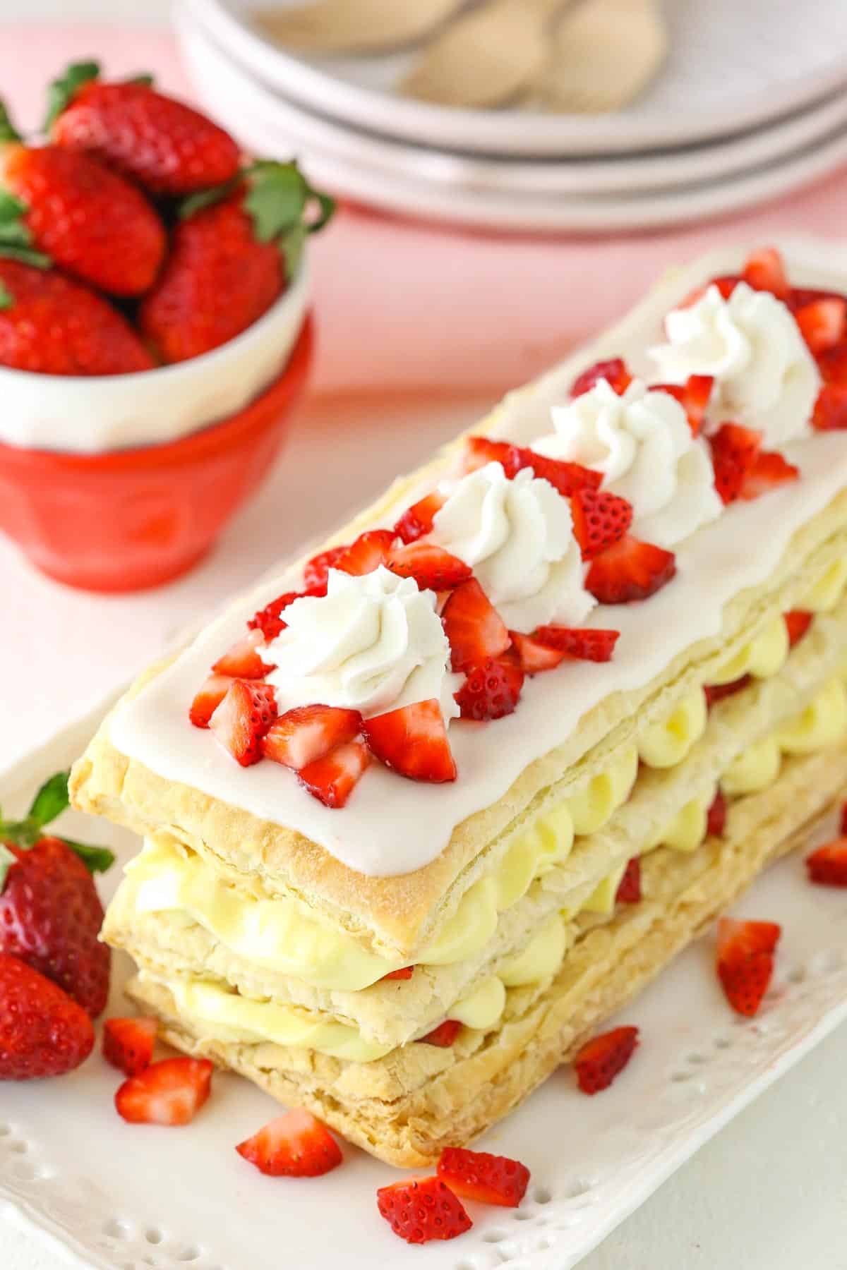 Top view of a Strawberry Napoleon on white serving tray.