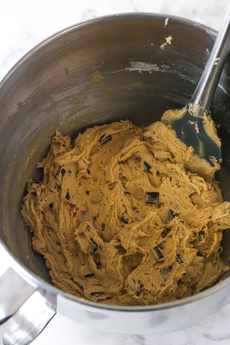 fully combined cookie dough in silver mixing bowl