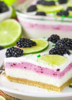 Close up of a slice of blackberry lime lush.