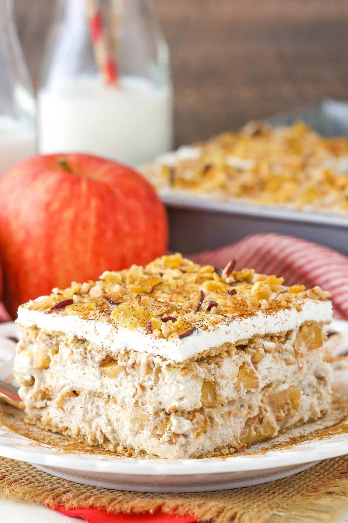A slice of cinnamon apple icebox cake on a white plate.