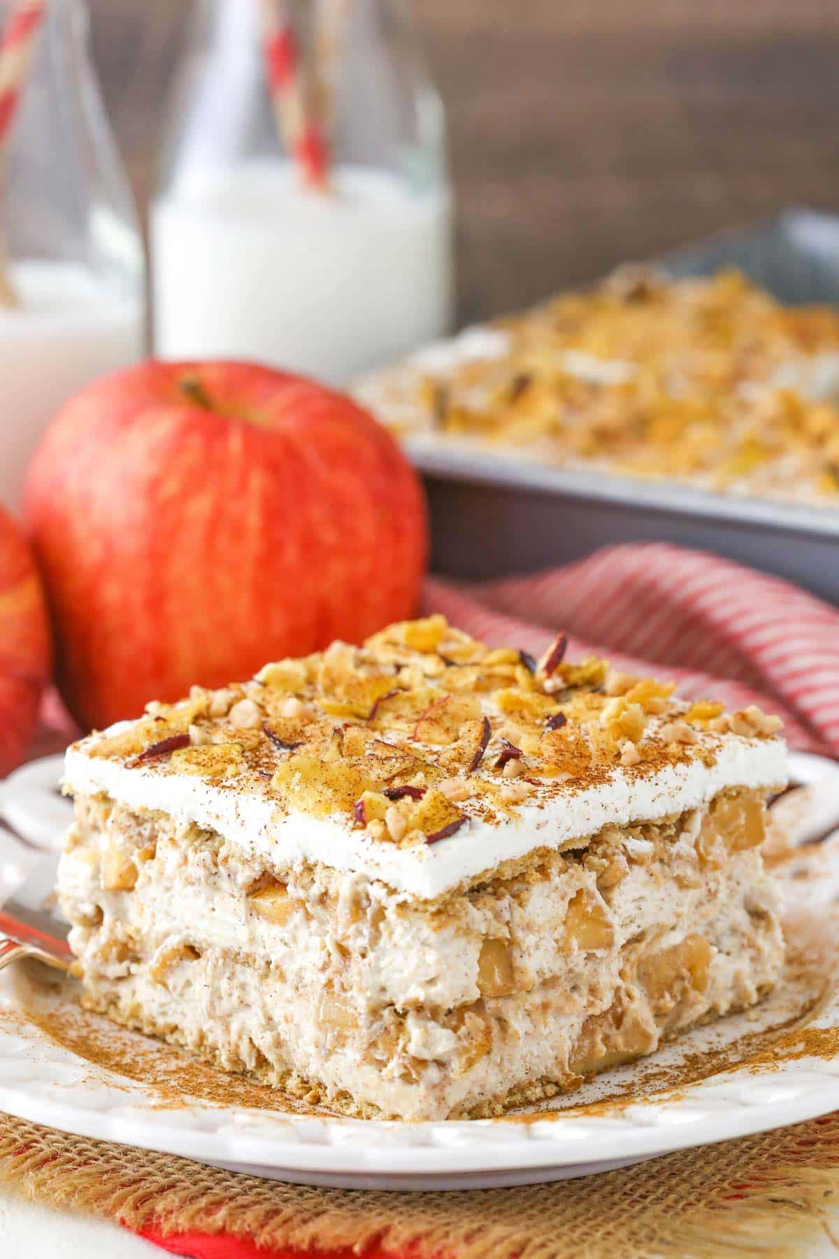 A slice of cinnamon apple icebox cake on a white plate.