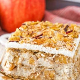 A slice of cinnamon apple icebox cake on a white plate.